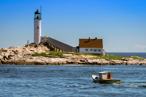 Lobster Boat Fishing By Isles of Shoals Light on White Island in New Hampshire