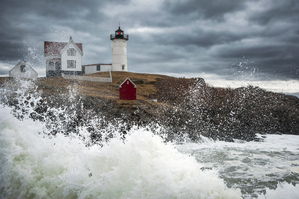 Waves Crash Around Cape Neddick Light As Storm Passes in Maine