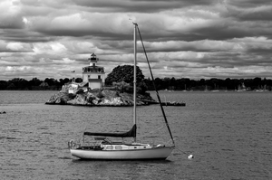 Storm Clouds Over Sailboat Moored by Pomham Rocks Lighthouse in Rhode Island - B&W