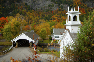 Autumn Colors By Covered Bridge and Church in White Mountains of New Hampshire