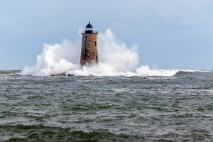 Giant Waves Around Stone Tower of Whaleback Light in Maine