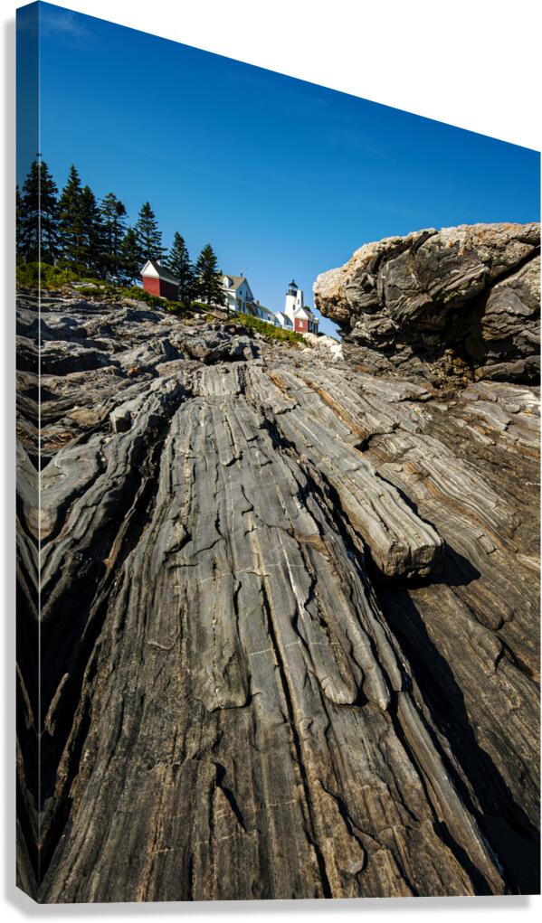 Rock Formations Extend Toward Pemaquid Point Lighthouse in Maine Canvas Print