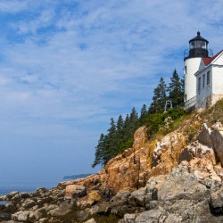 Bass Harbor Light Over Rocky Cliffs in Acadia National Park in Maine
