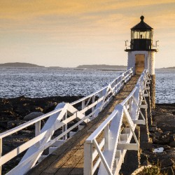Wooden Walkway to Marshall Point Lighthouse as Sun Sets in Maine