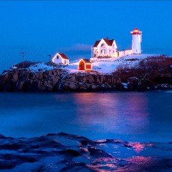 Lighted Cape Neddick Nubble Lighthouse During the Holidays in Maine