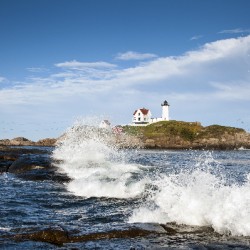 Surf Crashing by Cape Neddick Nubble Lighthouse in Maine