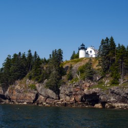 Bear Island Light Over Rocky Cliffs in Acadia National Park