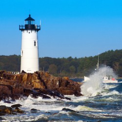 Portsmouth Harbor Light Guides Fishing Boat in Raging Surf in New Hampshire