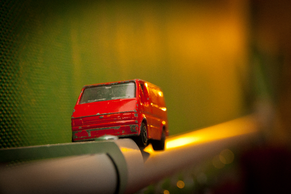 Toy car on a curtain rail by Jim Fitzpatrick