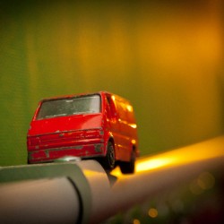 Toy car on a curtain rail