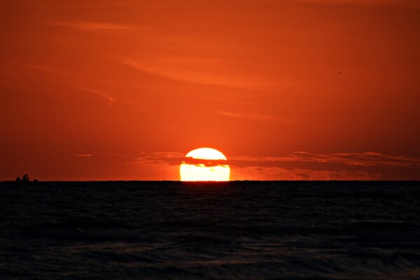 Sunset Behind the Clouds Print