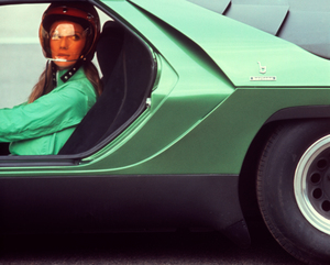 1970s WOMAN WEARING HELMET IN ITALIAN RACING CAR 185132