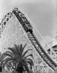 1960s YOUNG PEOPLE RIDING ON WOODEN ROLLER COASTER 186864