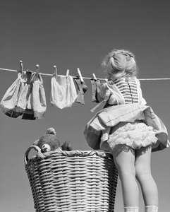 1950s GIRL HANGING LAUNDRY SHOWING RUFFLED PANTIES 188788