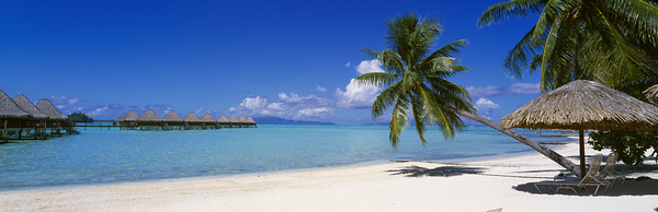 Lounge chair under umbrella Moana Beach Bora Bora French Polynesia 35232 by Panoramic Images