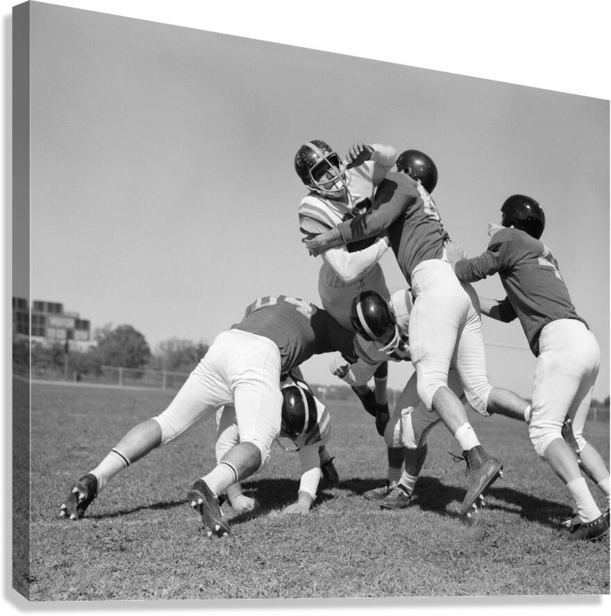 1960s SIX MEN PLAYING FOOTBALL GROUP TACKLE 186823 Canvas Print