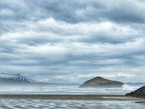 Waves crashing on the beach in Tofino