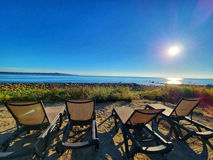 4 chairs in the sun oceanside