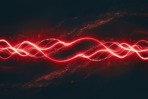 bright red wave particles in the dark background.