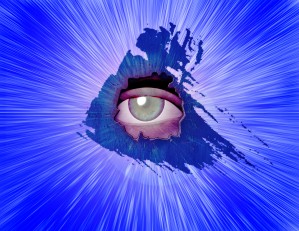 Eye behind wall crack