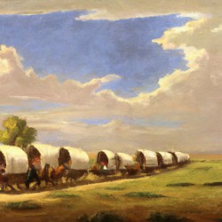 Wagon Train Across a Prairie