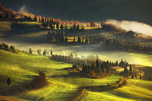 Foggy morning landscape in Tuscany. Pienza Italy.