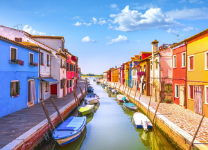 Burano island canal and colorful houses. Venice