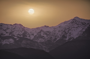 Alpi Apuane mountains in winter at sunset. Italy