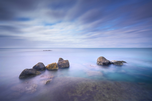 Rocks and sea long exposure photography.