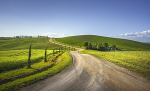 Route of the via Francigena. Winding road. Tuscany