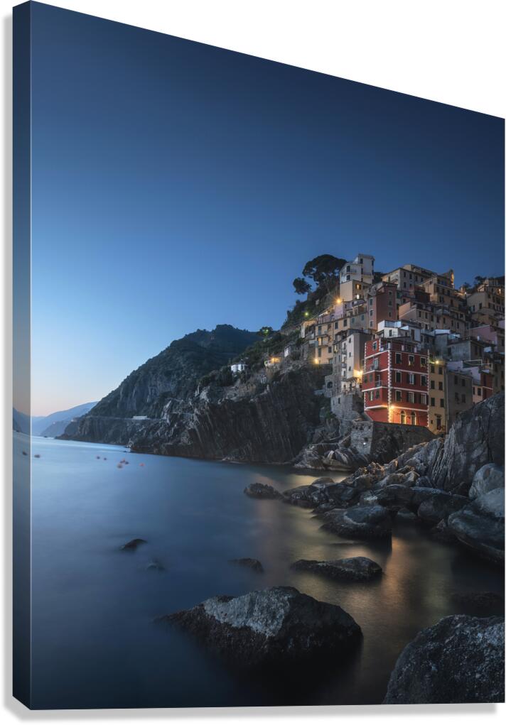 Blue twilight over the fishing village of Riomaggiore Canvas Print