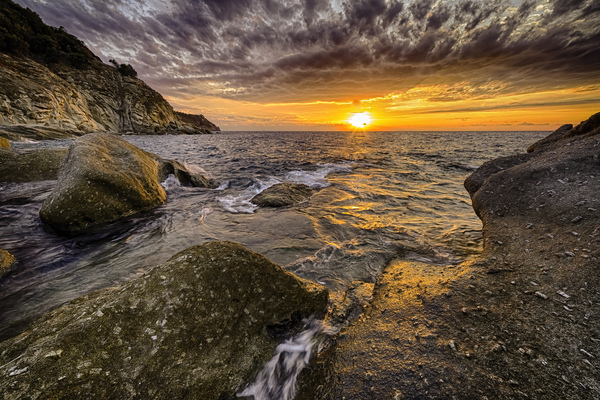 Scenic coastal sunset on island of Elba in Tuscany by Vivida Photo PC