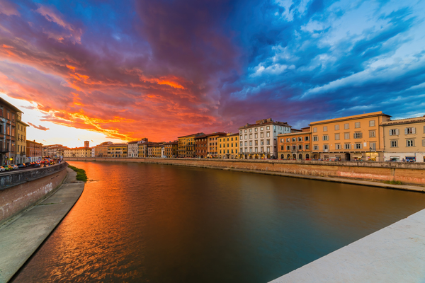 scenic sunset on river in Pisa  by Vivida Photo PC