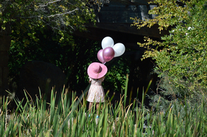 Girl With Pink Balloons