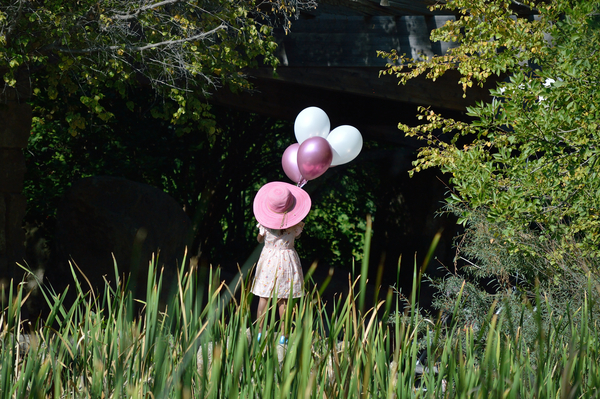 Girl With Pink Balloons by Michelle K Wood