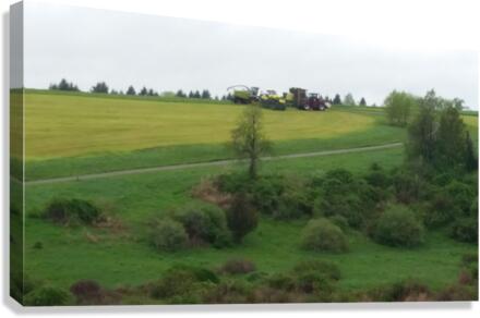 Tractor mowing Canvas Print