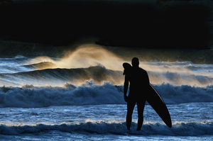 Surfer looking at the surf