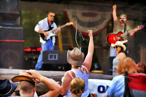Band getting crowd into the music
