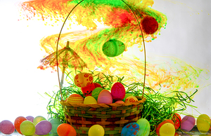 Easter basket underwater with colorful cloud floating down