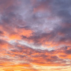Sunset or sunrise colors painting the sky with vibrant hues.