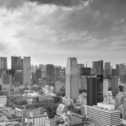 Tokyos impressive skyline is displayed in this black and white panoramic view of the city.