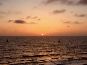 2 sailing at sunset