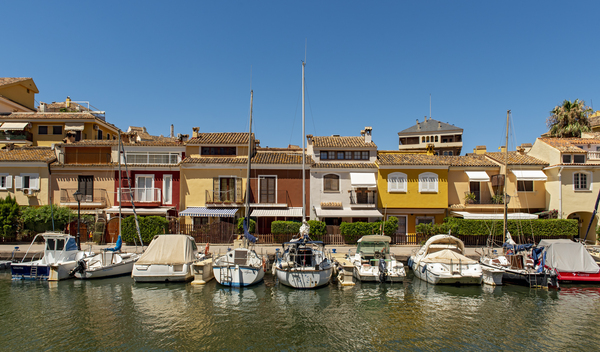 Boats and colourful houses Port Saplaya Spain by Petr Svarc