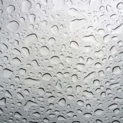 Abstract texture of water drops on a glass