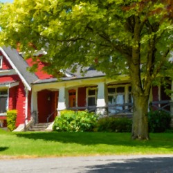 Big red farmers house in British Columbia Canada.
