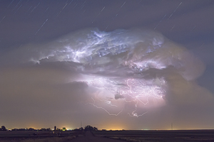 Cumulo nimbus Lightning Storm and Star Trails Above