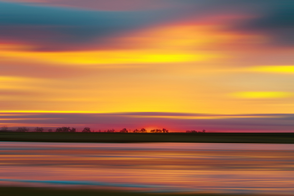 Abstract Sunset Over a Tree Line by Bo Insogna