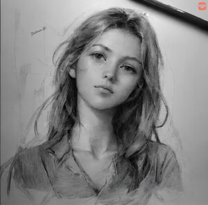 Shadows of Sorrow: A Charcoal Portrait