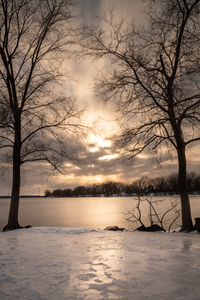 Sunset over the frozen lake