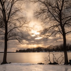 Sunset over the frozen lake